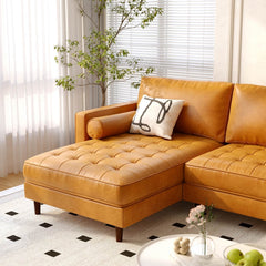 105 in Air Leather L Shaped Sectional Sofa with Chaise, 9 Birch Legs and 2 Bolster Pillows, Golden Brown