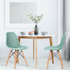 Pair of Modern Sage Green Shell Dining Chairs with Perforated Seat and Beech Wood Legs