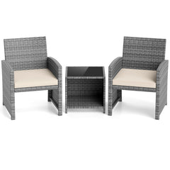 3 Piece Patio Rattan Bistro Set, 2 Grey Wicker Chairs Rated 400 lb with Beige Seat Cushions and an 18 in Glass Top Table with Shelf