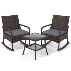 3 Piece PE Wicker Rocking Bistro Set, 2 Rocking Armchairs Rated 400 lb with Grey Cushions and 2 Tier Glass Top Side Table