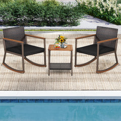 3 Piece Patio Rattan Rocking Bistro Set, 2 Rockers Rated 400 lb with Black Cushions and a Two Tier Acacia Top Table