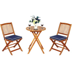 3 Piece Folding Acacia Wood Bistro Set, 2 Slatted Chairs with Navy Cushions and a 23.5 in Round Table