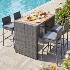 5 Piece Wicker Bar Height Patio Set, 48 Inch Acacia Top Table and Four Stools with Footrests, Grey