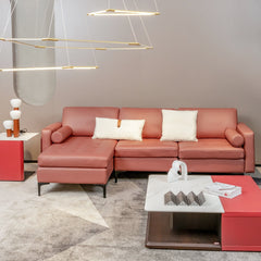 97 in L Shaped 3 Seat Sectional in Coral Leather Look Fabric with a 46.5 in Chaise to Lie On