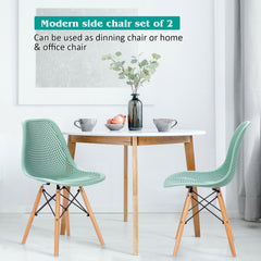 Pair of Modern Sage Green Shell Dining Chairs with Perforated Seat and Beech Wood Legs