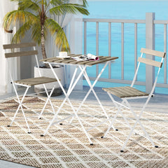 3 Piece Grey Wash Acacia Bistro Set, 21.5 Inch Slatted Square Table and 2 Folding Chairs on a White Metal Frame