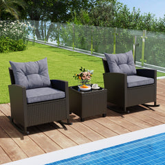 3 Piece Patio Rattan Rocking Chair Set, 2 Dark Brown Wicker Rockers Rated 400 lb with Grey Cushions and an 18 in Glass Top Table