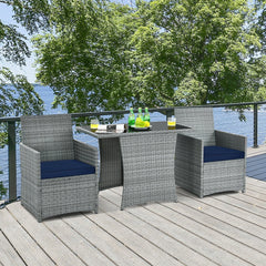 3 Piece Patio Wicker Dining Set, 2 Grey Armchairs Rated 350 lb with Navy Cushions that Tuck Under a 41 in Glass Top Table
