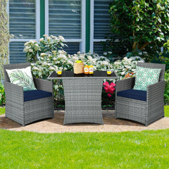 3 Piece Patio Wicker Dining Set, 2 Grey Armchairs Rated 350 lb with Navy Cushions that Tuck Under a 41 in Glass Top Table
