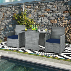 3 Piece Patio Wicker Dining Set, 2 Grey Armchairs Rated 350 lb with Navy Cushions that Tuck Under a 41 in Glass Top Table