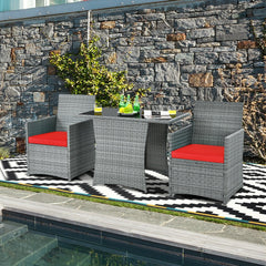 3 Piece Patio Wicker Dining Set, 2 Grey Armchairs Rated 350 lb with Red Cushions that Tuck Under a 41 in Glass Top Table