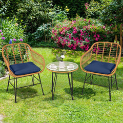 3 Piece Patio Rattan Bistro Set, 2 Open Weave Tub Chairs Rated 400 lb with Navy Cushions and a 19.5 in Round Glass Table