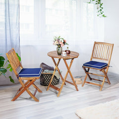3 Piece Folding Acacia Wood Bistro Set, 2 Slatted Chairs with Navy Cushions and a 23.5 in Round Table