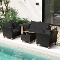 4 Piece Outdoor Conversation Set with 13.5 Gal Acacia Lidded Storage Coffee Table, 50 in Loveseat and 2 Armchairs, Black Cushions
