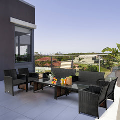 4 Piece Patio Rattan Cushioned Furniture Set with Loveseat, 2 Armchairs and Tempered Glass Coffee Table, Black Weave and Black Cushions