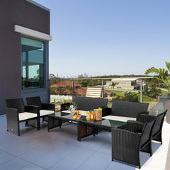 4 Piece Patio Rattan Cushioned Furniture Set with Loveseat, 2 Armchairs and Tempered Glass Coffee Table, Black Weave and Cream Cushions