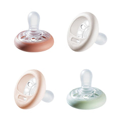 Tommee Tippee Breast-Like Pacifier, 0-6 Months, Skin-Like Texture, Symmetrical Design, BPA-Free Binky, Includes Sterilizer Box, Pack of 4