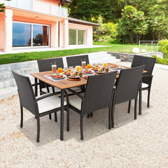 7 Piece Wicker Patio Dining Set for 6, 63 by 36 Inch Acacia Table with Rounded Corners and Six Armchairs