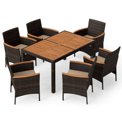 7 Piece Wicker Patio Dining Set for 6, 56 Inch Acacia Top Table and Six Deep Cushioned Armchairs, Brown