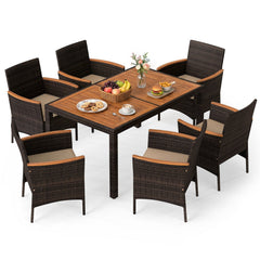 7 Piece Wicker Patio Dining Set for 6, 56 Inch Acacia Top Table and Six Deep Cushioned Armchairs, Brown