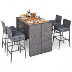 5 Piece Wicker Bar Height Patio Set, 48 Inch Acacia Top Table and Four Stools with Footrests, Grey