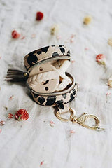 Itzy Ritzy Pacifier Case With Clip – Pacifier Charm Pod Includes Clasp to Easily Attach to a Diaper Bag or Purse; Measures 2.5” in Diameter and Holds 2 Pacifiers, Leopard