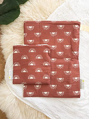 Itzy Ritzy Sealed Wet Bag with Adjustable Handle – Washable and Reusable Wet Bag with Water Resistant Lining Ideal for Swimwear, Diapers, Gym Clothes & Toiletries; Measures 11” x 14”, Terracotta Sunrise